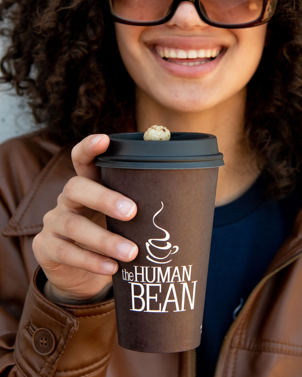 The Human Bean's Iconic Chocolate Covered Espresso Bean and Cup